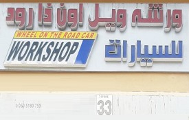 Wheel On The Road Car Auto Repair Workshop